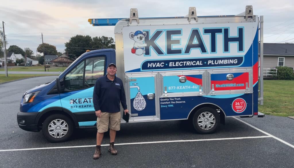 Keath HVAC tech standing by his truck